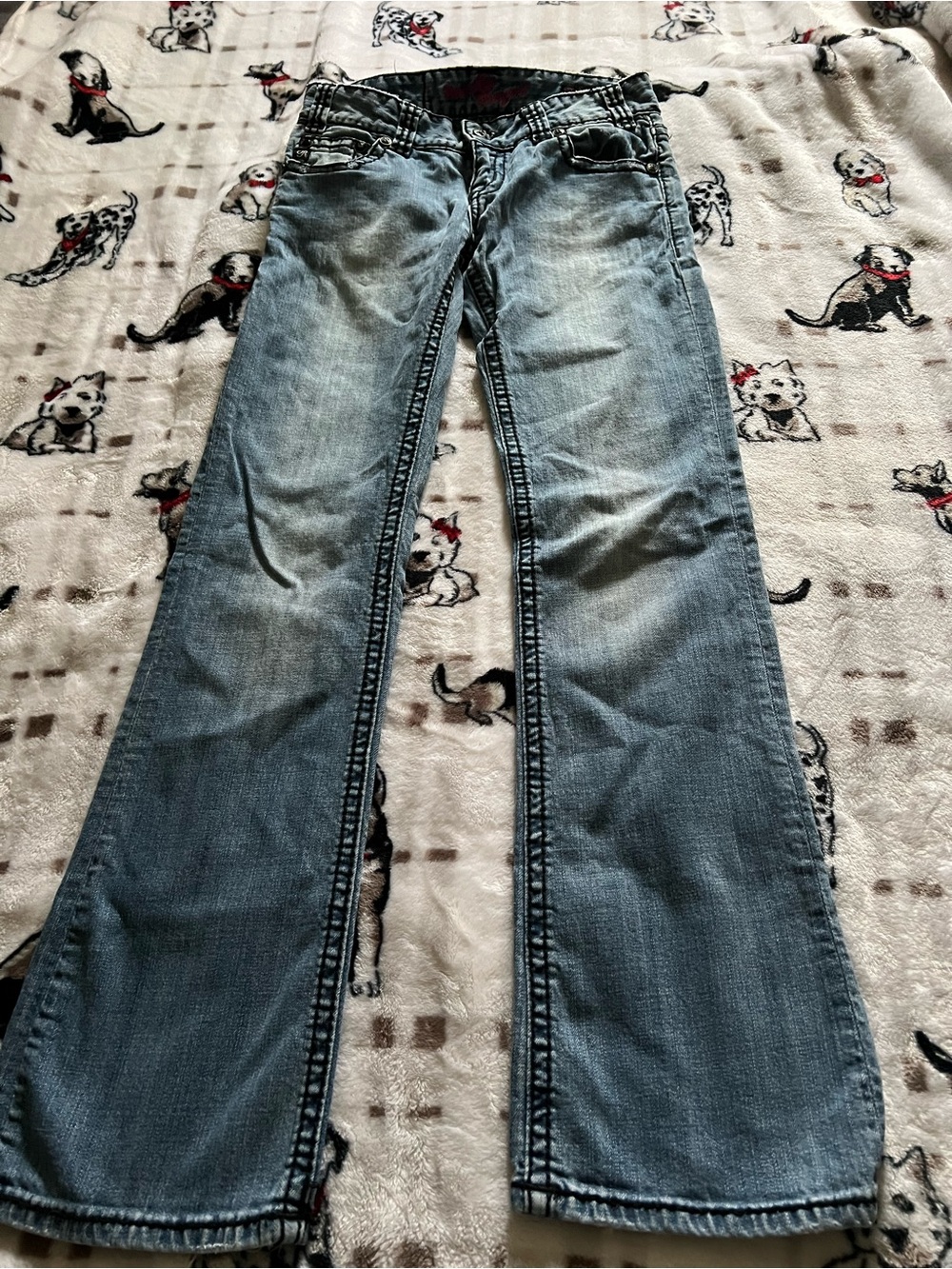 Light Blue Flared Jeans with Subtle Fading